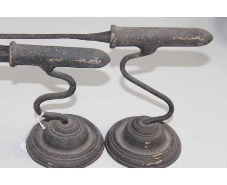 TWO 19TH CENTURY GOFFERING IRONS
together with a cast metal lamp (3)