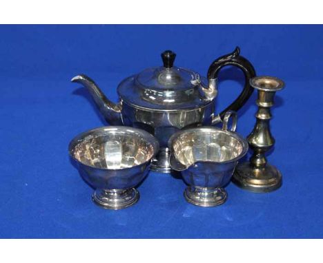 LOT OF SILVER PLATED WARES
including a three piece tea service, etc; together with dwarf brass candlesticks, flatware, etc 