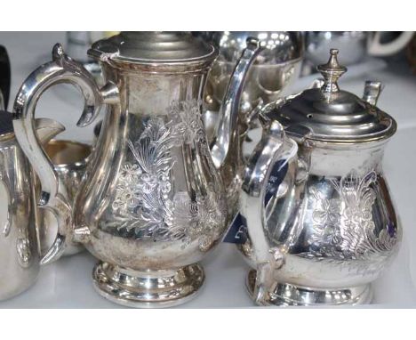 FOUR PIECE SILVER PLATED TEA SERVICE
comprising a teapot, coffee pot, sugar and cream, each with engraved detailing; together