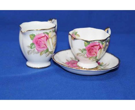 QUEEN ANNE FINE BONE CHINA 'LADY SYLVIA' PART TEA SERVICE
each decorated with rose transfer print on white ground, with gilt 