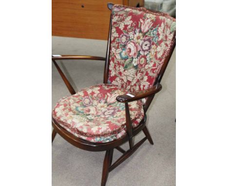 ERCOL ARMCHAIR AND A MAHOGANY PIANO STOOL