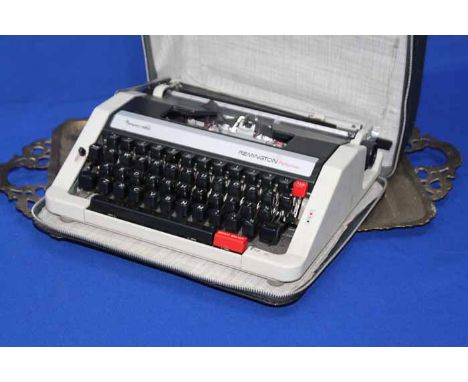 INDIAN BRASS TRAY 
and a Remington typewriter
