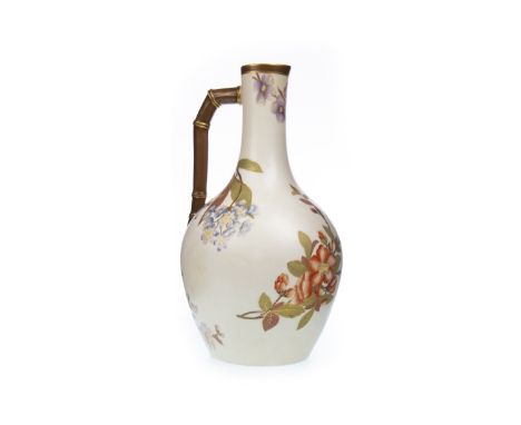 ROYAL WORCESTER BOTTLE SHAPED JUG, with stylised bamboo handle, painted with floral sprays on a blush ivory ground, printed m