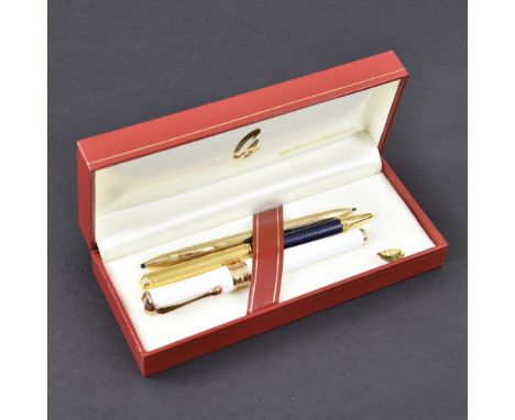 Chopard Roller Stift20. Jhdt.L. 13,3/13,7/12,5 cmVergoldet, bezeichnet Chopard. Dazu  Rollerstift Gilbert vergoldet mit Etui 