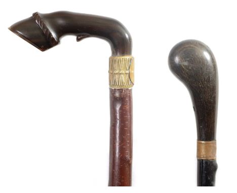 A LATE 19THCENTURY HORN HANDLED WALKING STICK AND ANOTHER the horses hoof example with metal ferrule on a notched hazel shaft