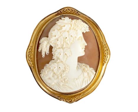 A FINE 19TH CENTURY CARVED CAMEO BUST PORTRAIT BROOCH depicting the head and shoulders of a young lady wearing fine relief ca