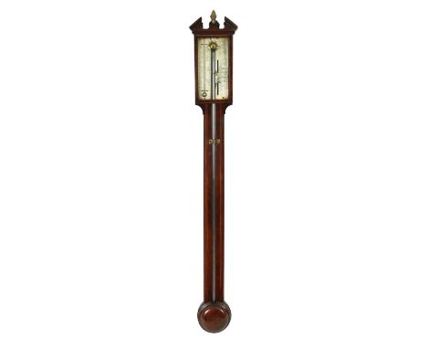 JOHN SILLE, FECIT. A REGENCY MAHOGANY STICK BAROMETER with architectural pediment above a glazed door enclosing a calibrated 