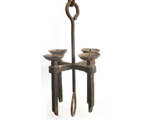 A 19TH CENTURY CAST IRON HANGING CANDLE LIGHT having four pricket stick branches and hanging chain51cm high 