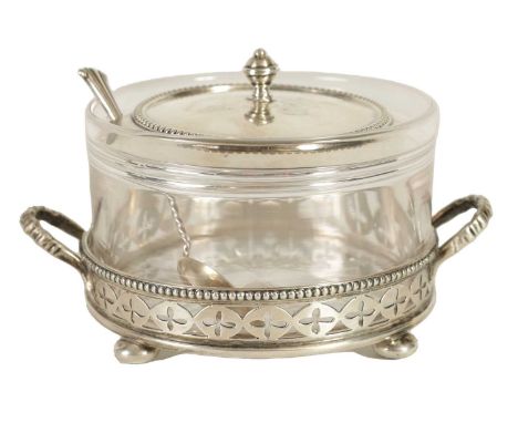 A LATE VICTORIAN SILVER AND CUT GLASS PRESERVE JAR, COVER AND STAND the plain body with star work base on a two-handled gadro