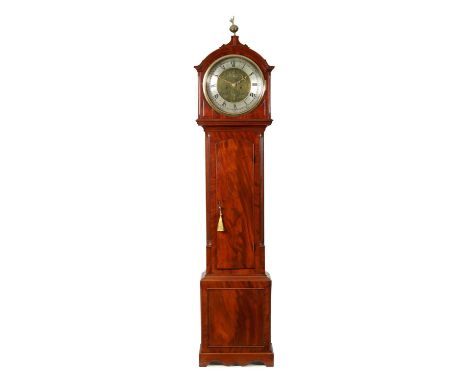 A REGENCY SCOTTISH FIGURED MAHOGANY LONGCASE CLOCK the arched top case with slender body and reeded quarter columns enclosing