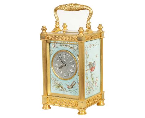 A LATE 19TH CENTURY GILT BRASS AND ENAMEL PANELLED REPEATING CARRIAGE CLOCK the case with reeded corner columns and filigree 