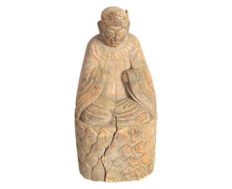 A CHINESE MING PERIOD CARVED WOODEN FIGURE OF AN IMMORTAL raised on a caved scale base27.5cm high