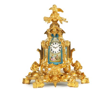 A SMALL LATE 19TH CENTURY FRENCH PORCELAIN PANELLED ORMOLU CARRIAGE STYLE MANTEL CLOCK the rococo style case surmounted by a 
