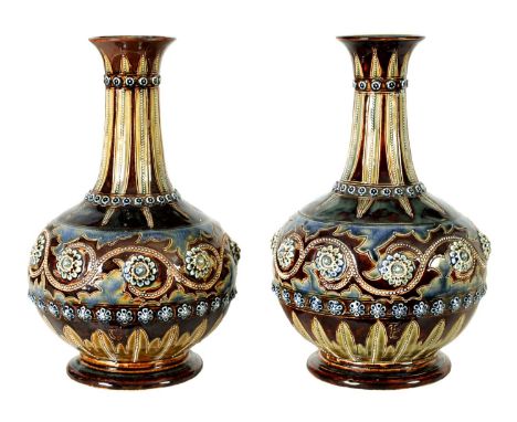 A GOOD PAIR OF DOULTON LAMBETH FOOTED BULBOUS FLARED NECK VASES BEARING MONOGRAM FOR GEORGE TINWORTH the mottled brown ground