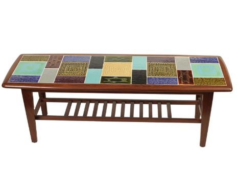 A 1960'S TILE-TOP TEAK COFFEE/OCCASIONAL TABLE of rectangular form with rounded edge top enclosing a random coloured patterne