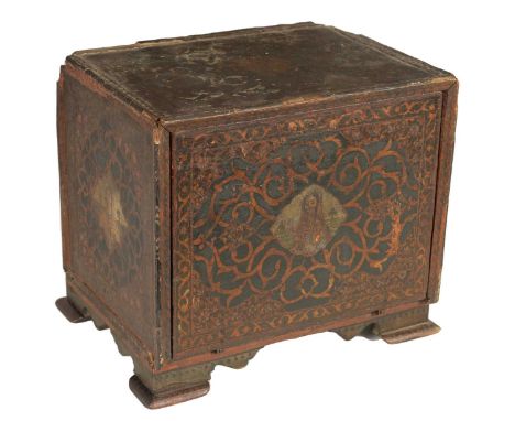 A 17TH CENTURY ANGLO INDIAN TABLE CABINET with scroll and portrait decorated painted body; the hinged fall down front enclosi