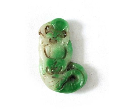 A CHINESE TWO TONE CARVED JADE SCULPTURE modelled as a sage with fish tail6cm high