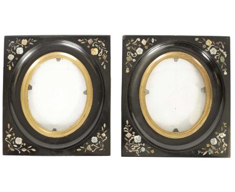 A PAIR OF 19TH CENTURY LACQUERED INLAID PORTRAIT FRAMES the floral inlaid corners in abalone, mother-of-pearl, pewter and bra