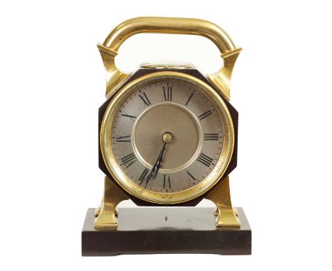 A LATE 19TH CENTURY FRENCH INDUSTRIAL POLISHED AND PATINATED BRASS DESK CLOCK surmounted by a brass handle and silvered compa