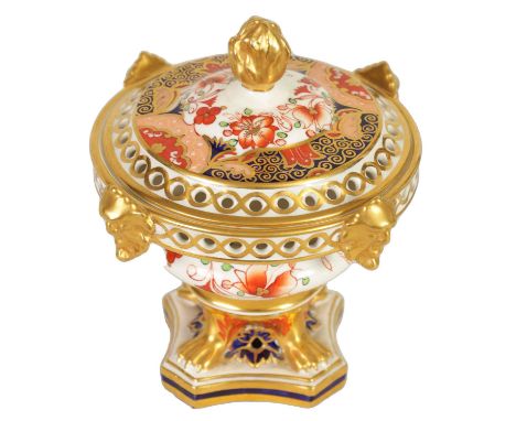 A 19TH CENTURY SPODE PORCELAIN POTPOURRI JAR AND COVER the urn-shaped body with gilt mask head mounts and pierced edges enclo