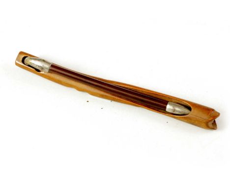 A MEIJI PERIOD JAPANESE PIPE AND PIPE CASE the carved wood case with nickel mounted pipe held in with a bayonet fitting21cm o