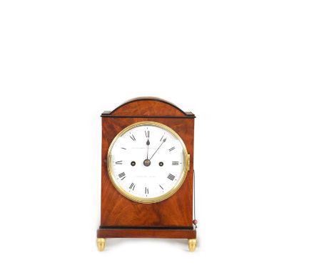 DWERRIHOUSE CARTER &amp; SON, BERKELEY SQUARE. A SMALL REGENCY FIGURED MAHOGANY BRACKET CLOCK the break-arched case having eb