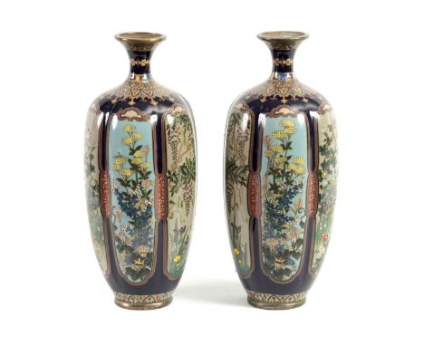 A FINE PAIR OF JAPANESE MEIJI PERIOD CLOISONNÉ VASES of slender shaped tapering form fully decorated with panels of floral sp