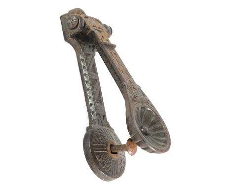 A LATE 19TH CENTURY AESTHETIC PERIOD CAST IRON DOOR KNOCKER with rounded inset end and geometric designs - bearing Victorian 