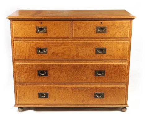 A 19TH CENTURY HONEY COLOURED OAK CHEST OF DRAWERS with moulded edge top above two small and three long graduated drawers fit