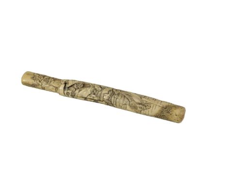 A MEIJI PERIOD JAPANESE CARVED ANTLER PIPE CASE depicting an emperor on horseback with guards in attendance in a floral setti