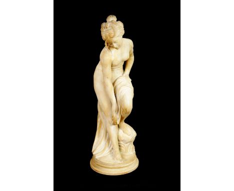 JOSEPH FRUGONI (1897 - 1923). AN EARLY 20TH CENTURY CARVED CARRARA MARBLE SCULPTURE depicting Venus - signed Frugoni au Bain,