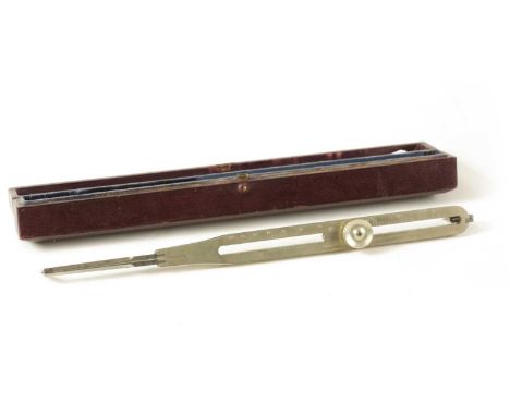 A CASED ADJUSTABLE PROPORTIONAL SILVERED COMPASS BY W.F. STANLEY, LONDON in original velvet lined red Moroccan leather caseCa