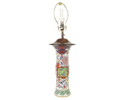 A 19TH CENTURY CHINESE PORCELAIN FAMILLE ROSE CYLINDRICAL VASE with flared neck and decorated in brightly coloured floral des