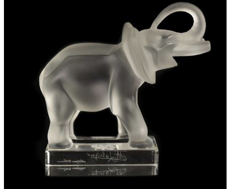 A LALIQUE FROSTED GLASS ELEPHANT with raised trunk standing on a plinth base - with double signature 15.5cm highIn undamaged 