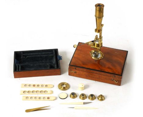 WATKINS & HILL, CHARING CROSS, LONDON. AN EARLY 19TH CENTURY TRAVELLING MICROSCOPE with figured mahogany case and ebony strun