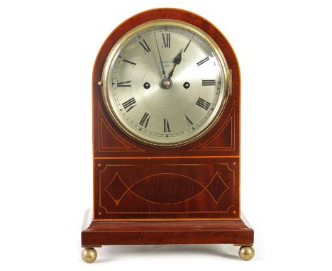 AN EDWARDIAN DOUBLE FUSEE MAHOGANY BRACKET CLOCK the arched case with boxwood string inlay enclosing a 6.5" silvered dial wit