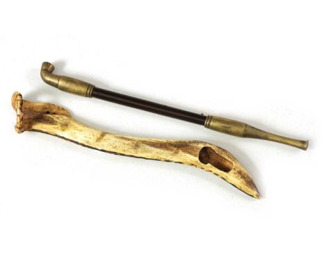 A JAPANESE MEIJI PERIOD CARVED ANTLER PIPE CASE AND PIPE with leaf carved decorationCase 19.5cm overall
