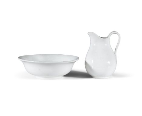 A BELLEEK SECOND PERIOD WASH JUG AND BASIN,Jug 26cm high, Basin 35cm diameter***PLEASE NOTE: Description in the printed catal