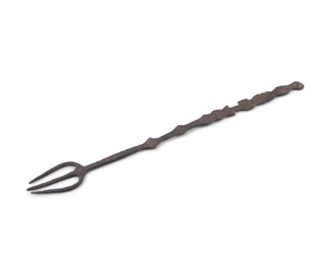 AN EARLY 19TH CENTURY WROUGHT IRON HEARTH FLESH FORK,the long flattened handle with pierced terminal for hanging, with naïve 