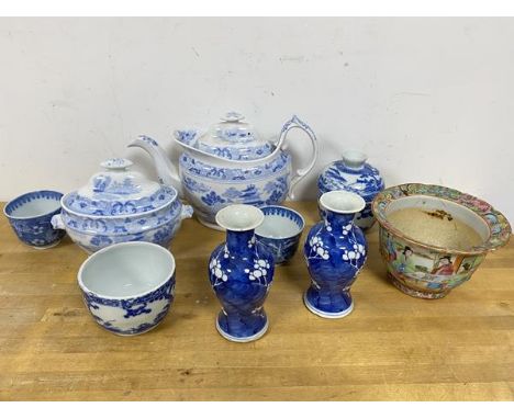 A mixed lot of blue and white china including two small boulster shaped vases with prunus decoration and two concentric rings