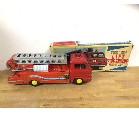 A mid 20thc Lift fire engine, made in Japan with original box measures 14cm x 37cm x 13cm
