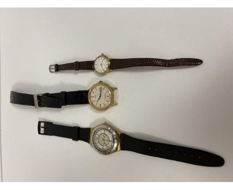 A group of three wrist watches including Swatch, Timex and a Seconda ladies wrist watch (3)
