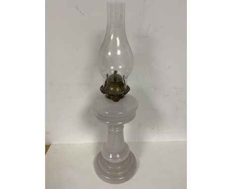 An early 20thc opaline glass oil lamp shade marked Griffin Brand measures 48cm high with shade