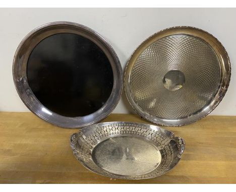 An Epns engine turned circular salver on ball feet measures 3cm x 29cm another drinks tray and pierced dish (3)