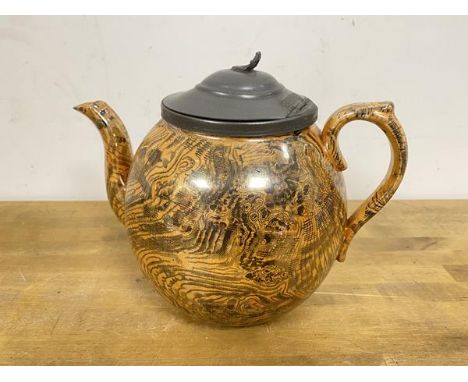 An unusual 19thc Staffordshire teapot with metal hinged lid and an abstract landscape inspired transfer printed decoration to