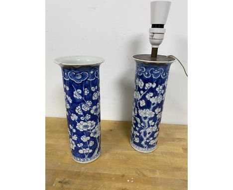 A blue and white Chinese spill vase with punus decoration later converted to a lamp and another similar vase measures 26cm hi
