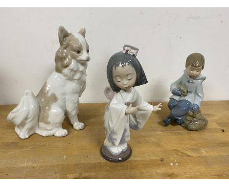 A Lladro figure of young Japanese girl measuring 19cm high also a Nao figure of dog and another of Young Boy Holding Rabbit