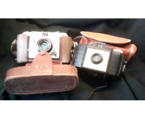 Camera's (2) -JL Ford Camera in case made in Germany-Kodak Brownie 127 Camera in case.