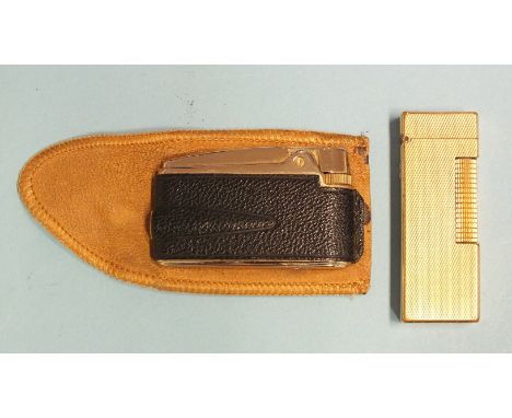 A Dunhill plated lighter and a Ronson lighter, (2). 
