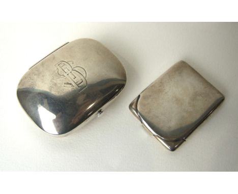 A Victorian silver snuff box of rounded rectangular form, stamped Lewis, St James Street, London 1874, maker JB and a plain s